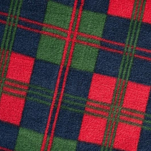 A close-up of the GIGSAK red, blue, and green tartan fleece fabric
